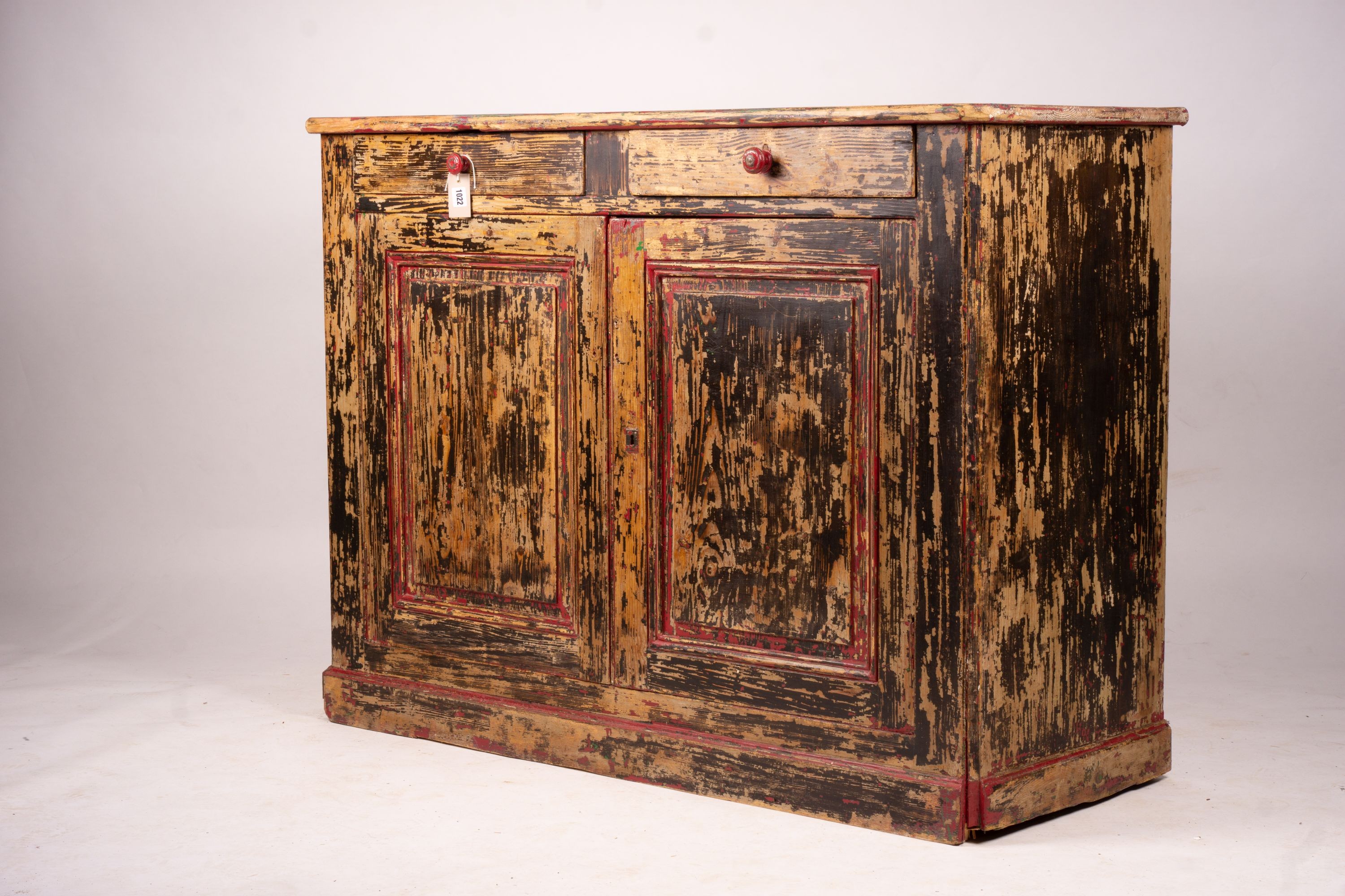 A 19th century French painted pine two door cabinet with scraped finish, width 140cm, depth 57cm, height 105cm